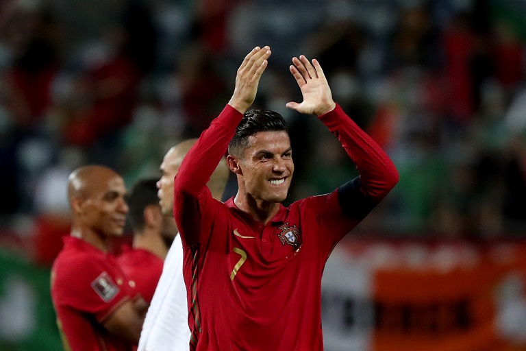 Portugal's forward Cristiano Ronaldo celebrates after scoring his second goal during the FIFA World Cup 2022 European qualifying round group A football match between Portugal and Republic of Ireland, at the Algarve stadium in Faro, Portugal, on September 1, 2021.