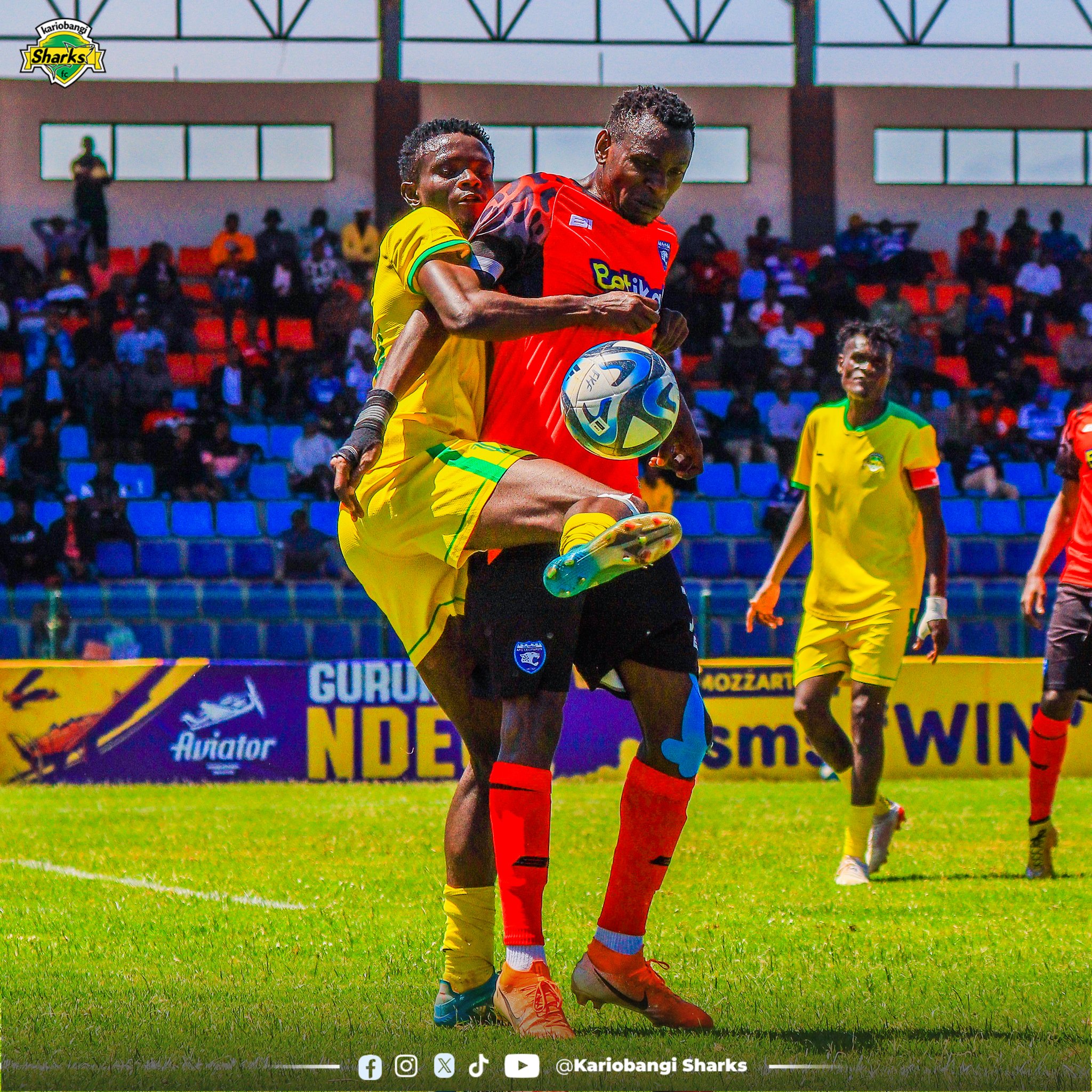 AFC Leoprads and Sharks players in Action in the first leg