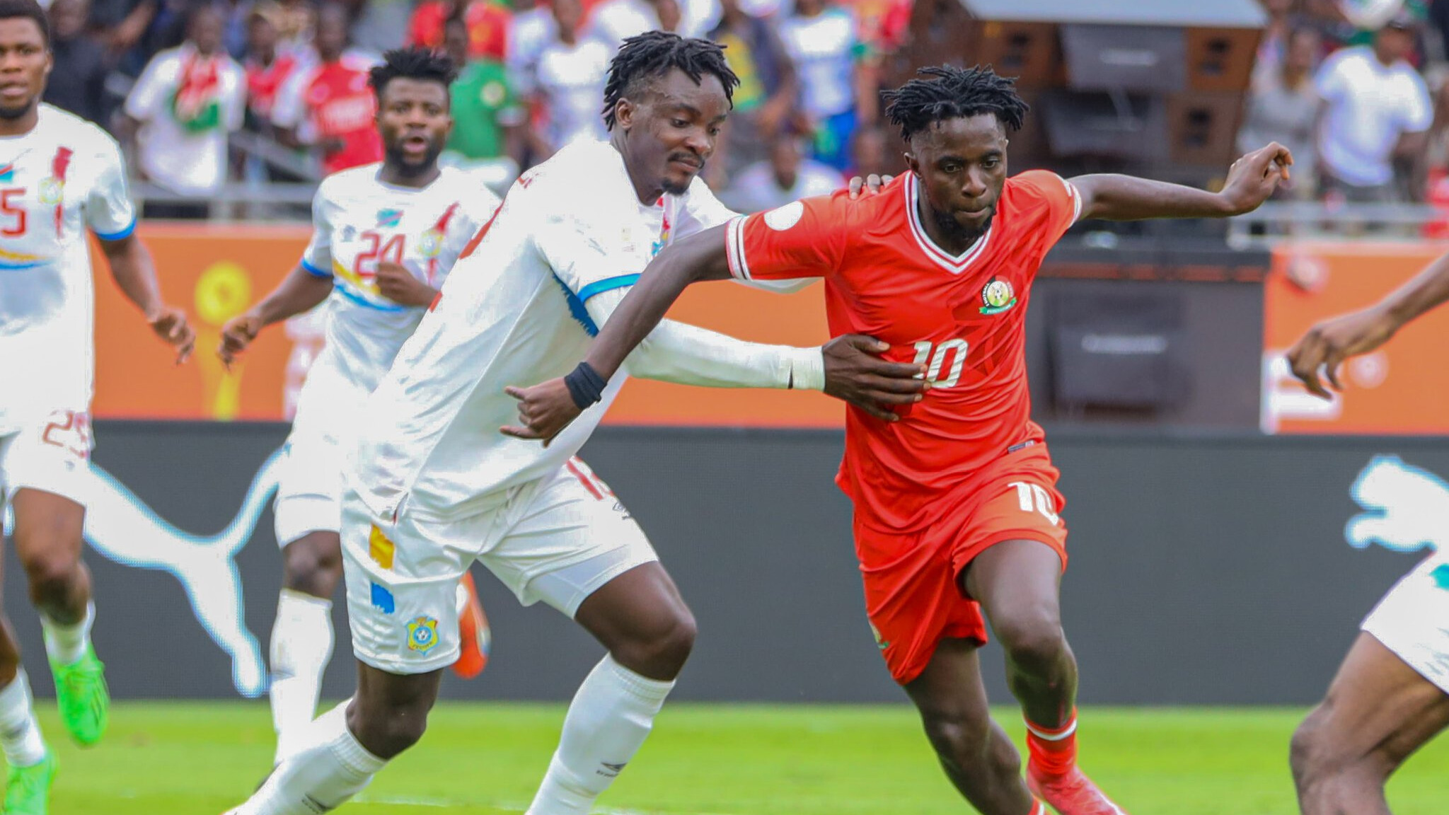 Harambee Stars player Austin Odhiambo alongside DR Congo player //PHOTO Harambee Stars