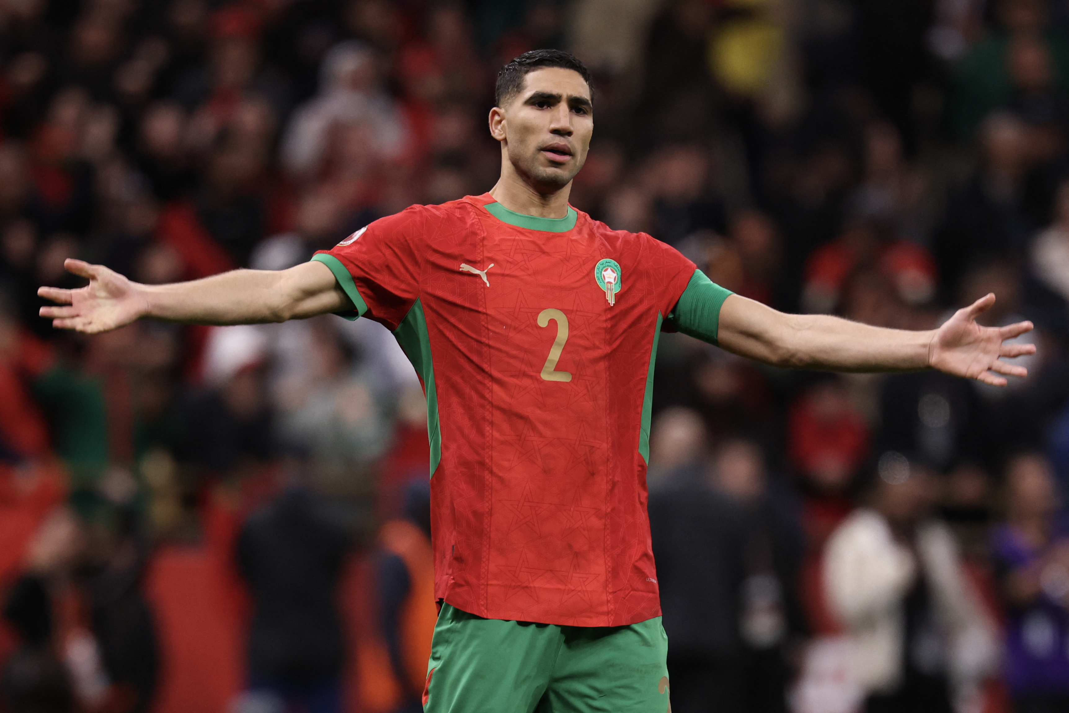 Achraf Hakimi celebrates after scoring in the Morocco vs Nigeria game