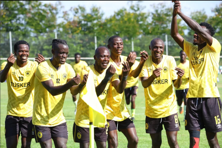 The Brewers celebrate together during a Kenyan football match.
